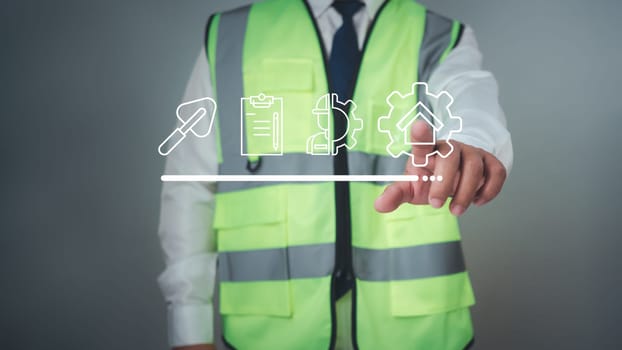 Architect or engineer Pointing finger at construction related icons, Project presentation plan, Construction cost planning, Cost calculation, construction planning, Structural calculation.