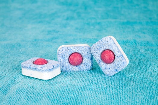 Group of three modern chemical tablets for dishwasher