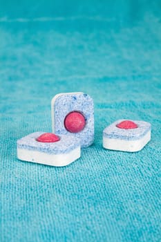 Group of three modern chemical tablets for dishwasher