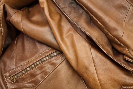 Detail of light brown leather clothing with a distinctive color and texture