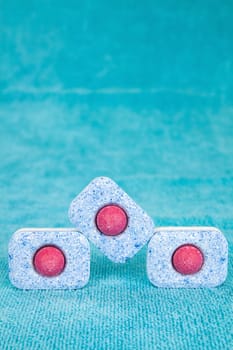 Group of three modern chemical tablets for dishwasher