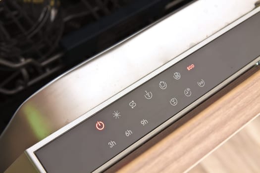 Digital control panel of a modern home dishwasher