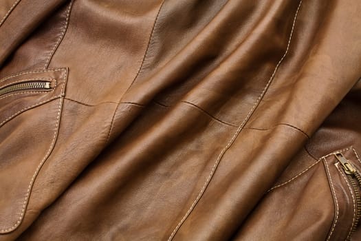 Detail of light brown leather clothing with a distinctive color and texture