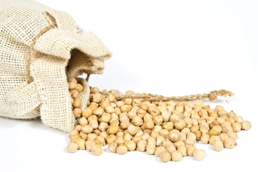 Hemp bag filled with chickpeas on a white background
