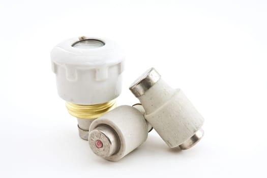 Ceramic fuses for domestic electrical installation on a white background