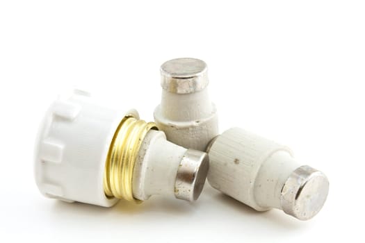Ceramic fuses for domestic electrical installation on a white background