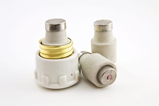 Ceramic fuses for domestic electrical installation on a white background