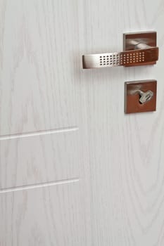 Modern metal hardware for interior doors in a geometric shape