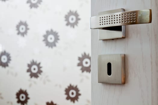 Modern metal hardware for interior doors in a geometric shape