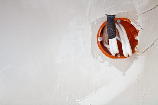 Wall power socket mounted on a plasterboard wall
