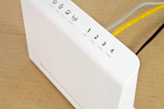 Desktop ADSL modem on a workbench associated with the global network