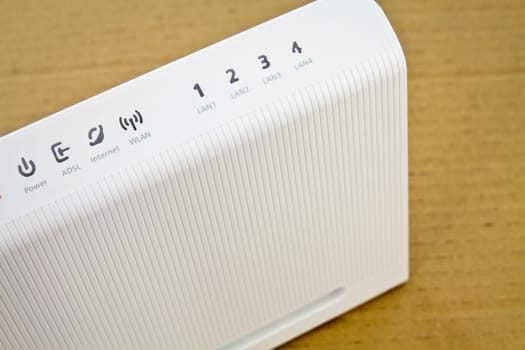 Desktop ADSL modem on a workbench associated with the global network