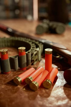 Bullets cartridge and belt chain for storage in weapon shop. Hunter armament and munitions assortment