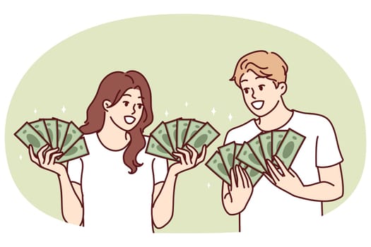 Man and woman with lot of cash in hands brag about money they earned from business or winning jackpot in lottery. Couple rich guys girls with money want to invest savings or invest in startup