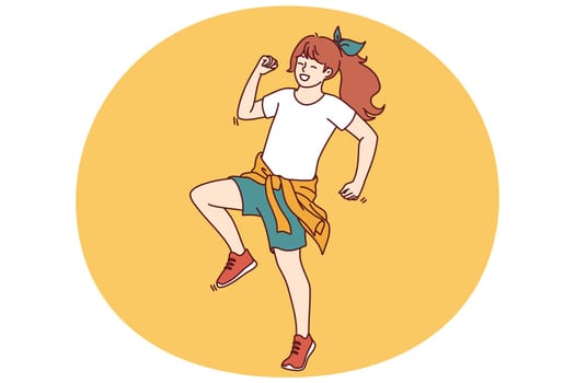 Little girl elementary school student stands in pose of running person for concept of happy childhood. Positive teenage girl with good mood dressed in casual clothes for summer walks