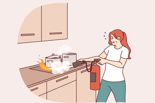 Woman puts out fire in kitchen with fire extinguisher, and panics for fear of combustion spreading. Flame engulfed cooker with pots due to violation safety regulations or careless handling of matches