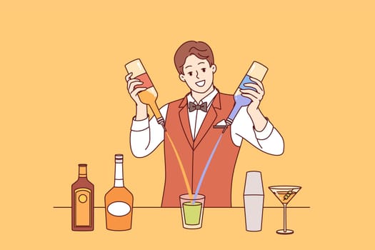 Man bartender mixes cocktail from different alcoholic drinks standing at bar counter of nightclub. Experienced bartender prepares signature drink from liquor and syrup during holiday party or festival