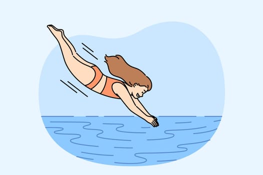 Little girl dives into pool to swim in water or enjoy swim in sea to cool off from hot sun. Woman in swimsuit relaxes at resort and enjoys jumping in pool and doing sports or diving
