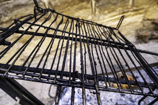 Detail of old grill for grilling, dirt and rust
