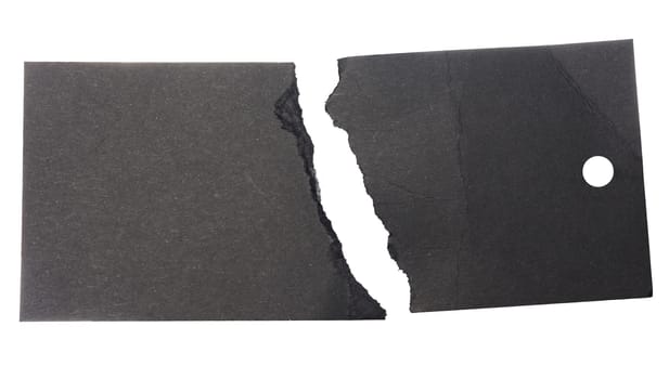Torn black paper price tag on isolated background