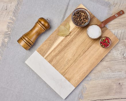 Empty rectangular wooden cutting board on table, top view