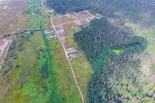 Top view of the village, fields and forests near the village