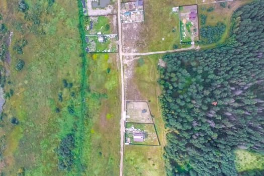 Top view of the village, fields and forests near the village