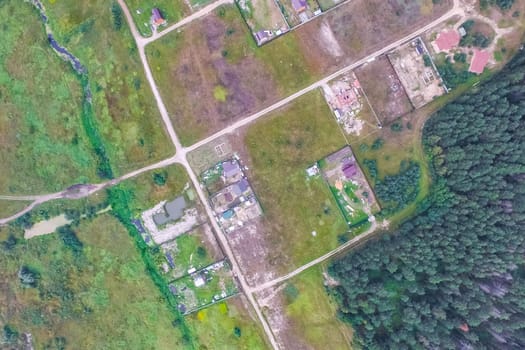 Top view of the village, fields and forests near the village