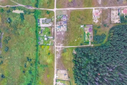 Top view of the village, fields and forests near the village