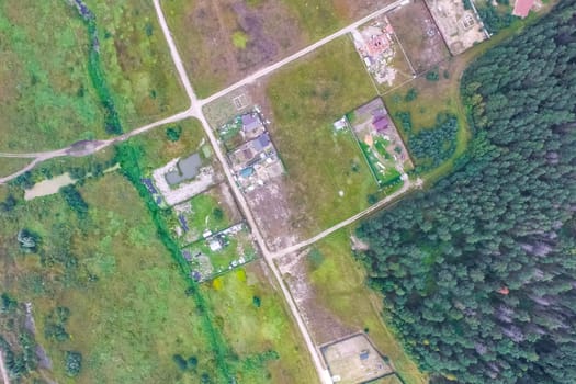 Top view of the village, fields and forests near the village