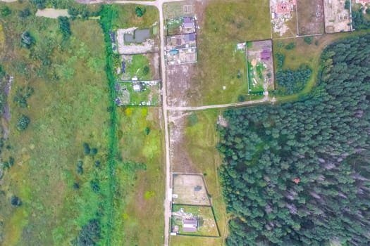 Top view of the village, fields and forests near the village