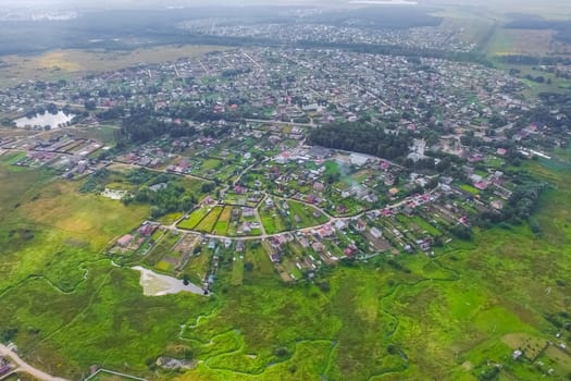 Top view of the village, fields and forests near the village