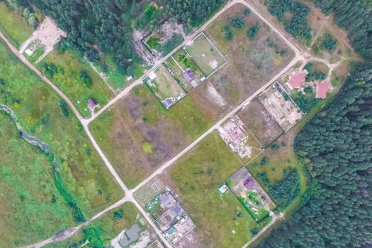 Top view of the village, fields and forests near the village