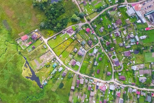 Top view of the village, fields and forests near the village