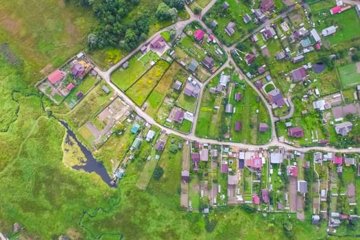 Top view of the village, fields and forests near the village