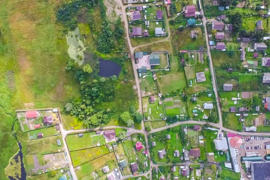 Top view of the village, fields and forests near the village