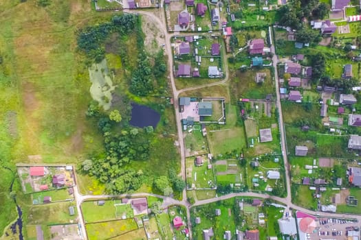 Top view of the village, fields and forests near the village