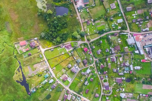 Top view of the village, fields and forests near the village
