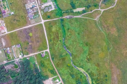 Top view of the village, fields and forests near the village
