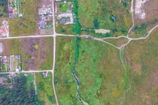 Top view of the village, fields and forests near the village