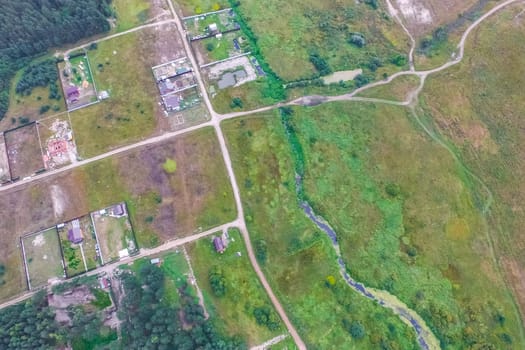 Top view of the village, fields and forests near the village