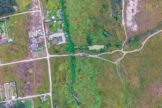 Top view of the village, fields and forests near the village