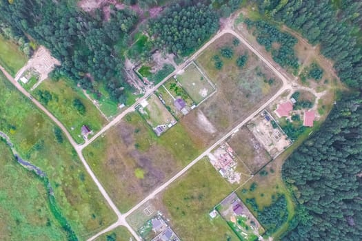Top view of the village, fields and forests near the village