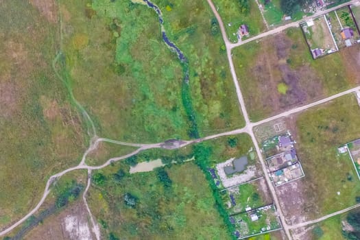 Top view of the village, fields and forests near the village