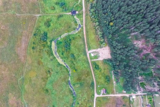 Top view of the village, fields and forests near the village