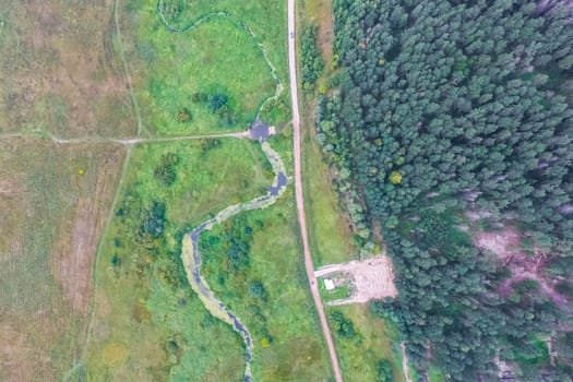 Top view of the village, fields and forests near the village