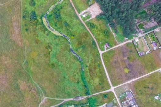 Top view of the village, fields and forests near the village