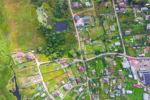Top view of the village, fields and forests near the village