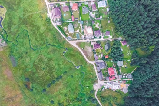 Top view of the village, fields and forests near the village