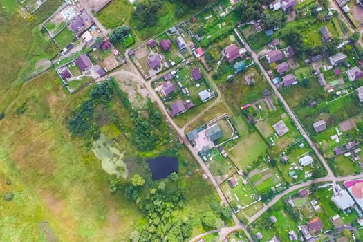 Top view of the village, fields and forests near the village
